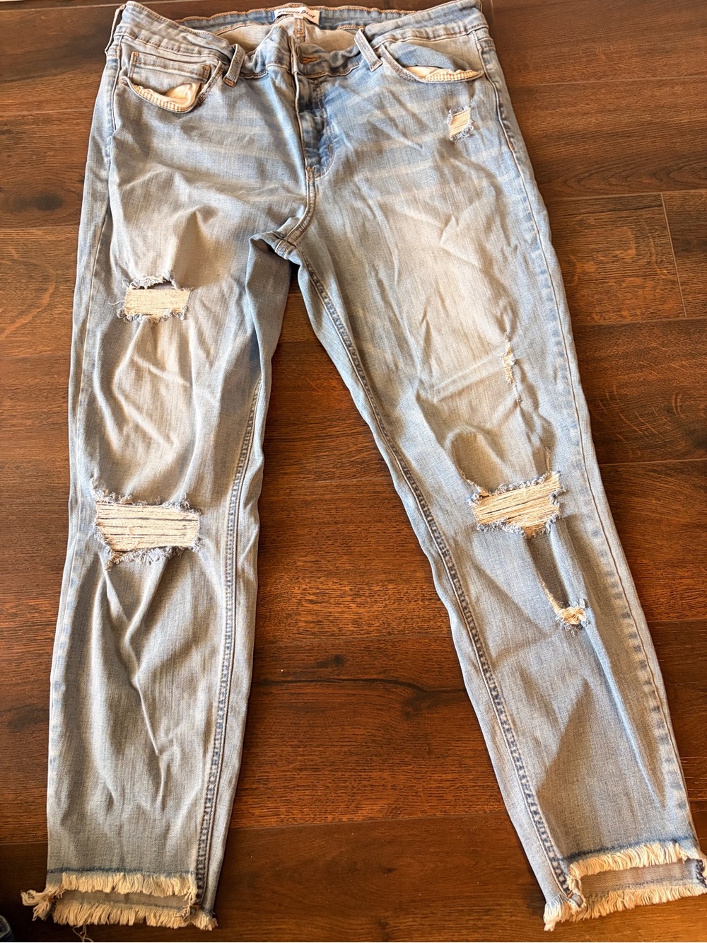 Studio Light Blue Distressed Ankle Jeans